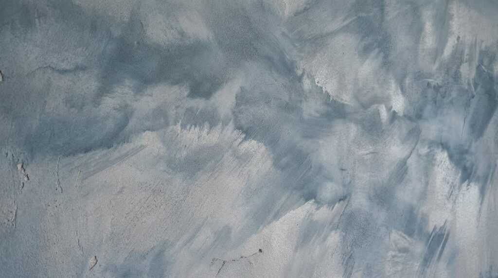 A detailed close-up shot of a modern wall featuring geometric layered panels with sharp shadows.