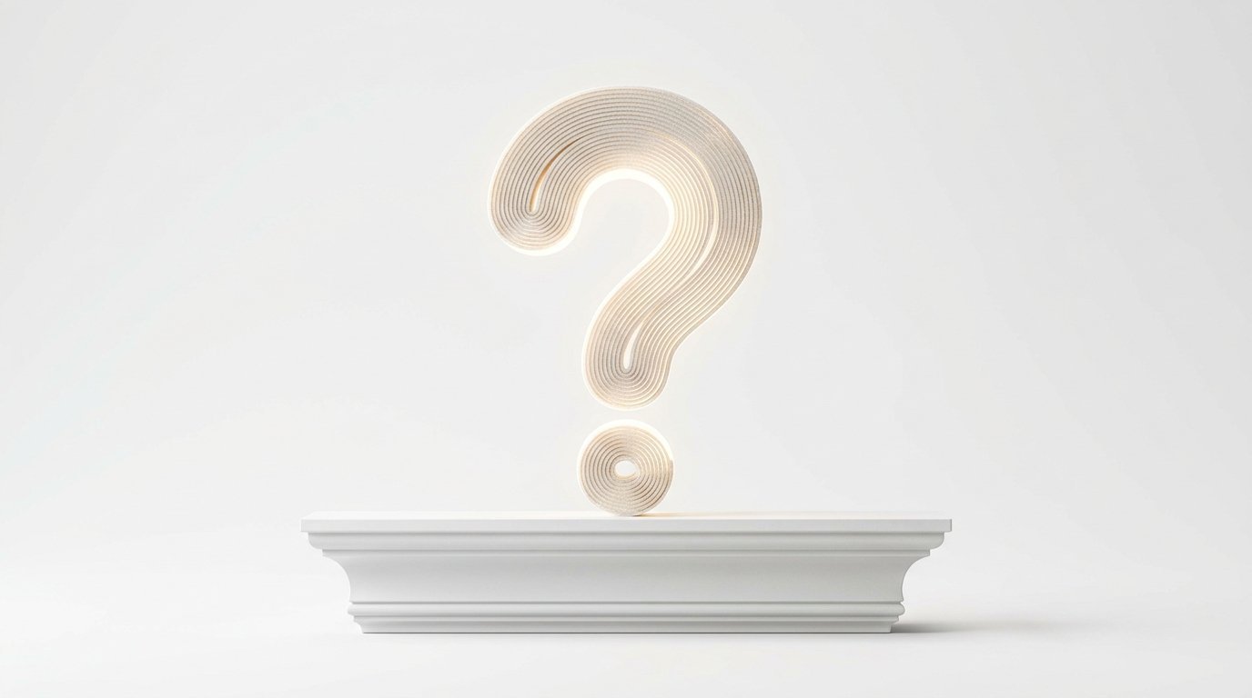 A white architectural plinth supports a sculptural, backlit question mark with a textured, ribbed surface.